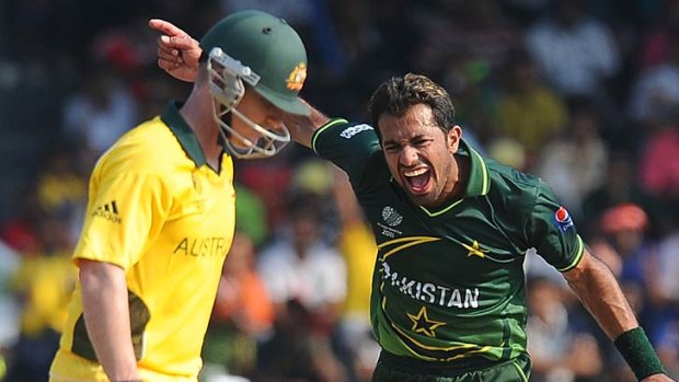 Pakistan fast bowler Wahab Riaz celebrates after he dismissed Australian batsman Brad Haddin.