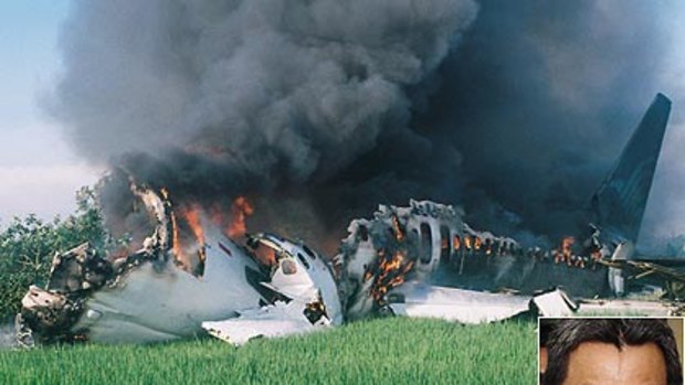 The 2007  Yogyakarta crash and inset, out on bail the pilot Marwoto Komar yesterday.