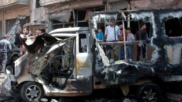 A truck damaged in the blast in Homs.