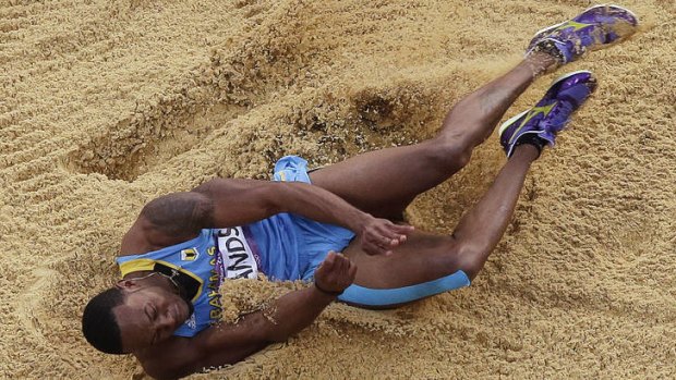 Olympics over ... Leevan Sands injures himself during a jump.