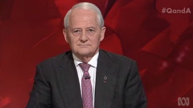 Senior Coalition MP Philip Ruddock wore his Amnesty International badge with pride and was confronted by US academic Cornel West over Australia's immigration policy.