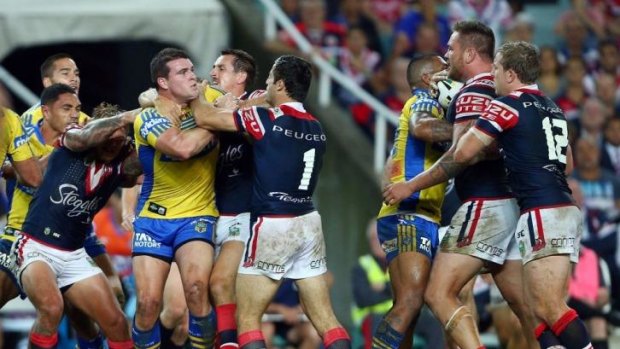 Heat of the moment: Eels and Roosters players square up after Darcy Lussick's high tackle on Jared Waerea-Hargreaves.