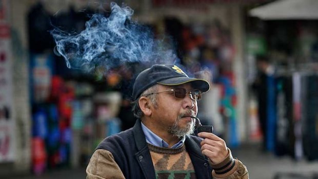 A smoker for 50 years, Joseph Nguyen has ignored his doctor's advice and has no intention of giving up.