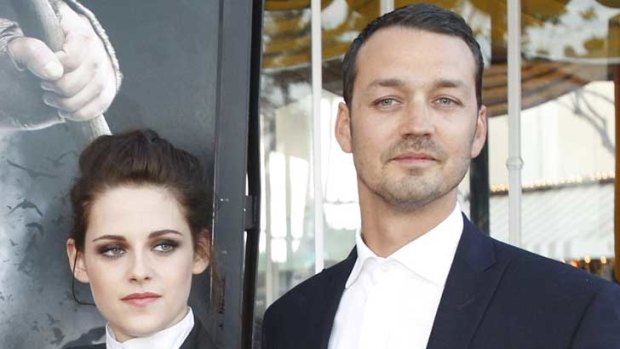 Kristen Stewart poses with director Rupert Sanders, with whom she had an affair that allegedly lasted for "months."