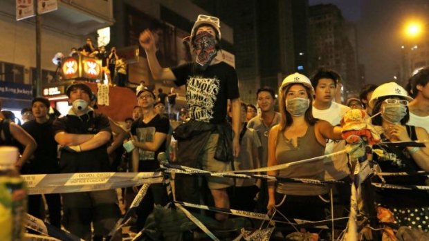 Pro-democracy protesters rally in Mong Kok after being told to clear the streets by Monday.