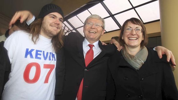 Well-received: Kevin Rudd on the election trail in the town of Springwood in the lower Blue mountains with local member Susan Templeman and supporter Bennedict Kennedy-Cox wearing an old campaign t-shirt.