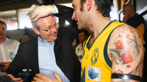 An inspiration: Prime Minister Kevin Rudd meets Kinglake player Jake Tommy De Marco.