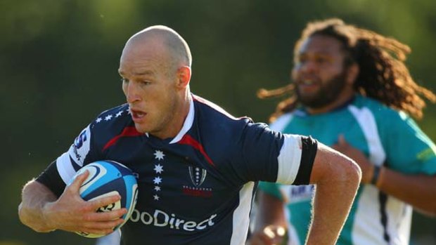 Stirling Mortlock runs in a try for the Rebels in a trial match against Fiji in Ballarat on Saturday.