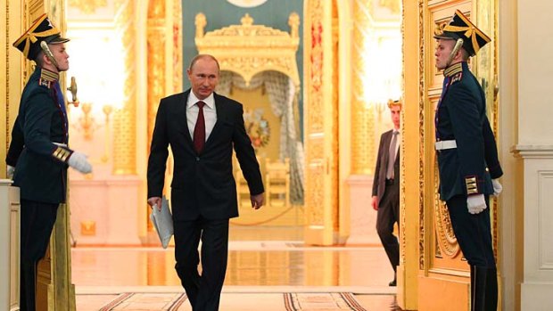 Talking up the economy &#8230; Vladimir Putin makes his way to give his state of the nation address, in which he said ''we will implement everything we planned''.