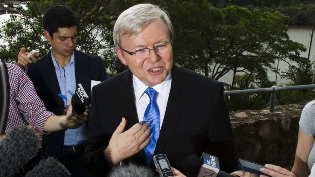 Who, me? Kevin Rudd addresses the media in Brisbane.