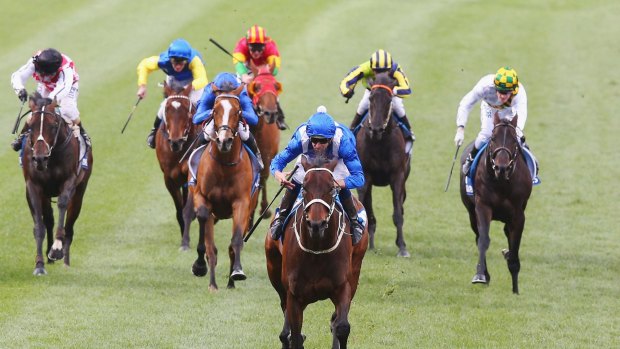 Streeting ahead: Jockey Hugh Bowman rides Winx to victory.