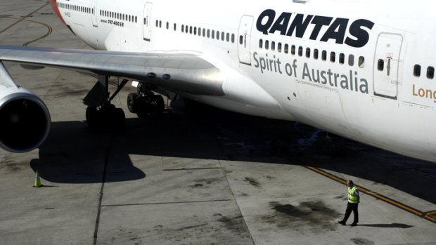 Qantas could report a record bottom-line loss approaching $1billion.