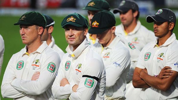 Not much to cheer about: Michael Clarke and his team during the presentation after the Test was called off.