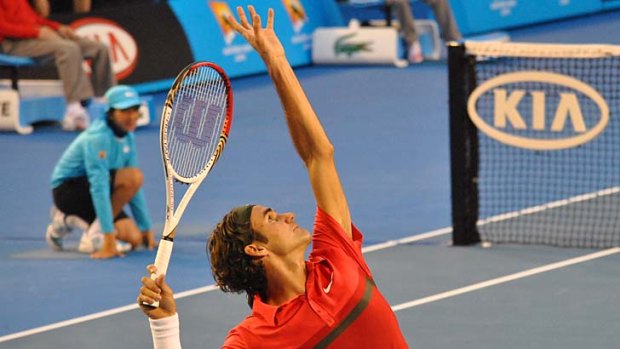 Service... Roger Federer demolished Russian Alexander Kudryavtsev on centre court on day one of the 2012 Australian Open, while an IT army worked in the rooms below the arena.