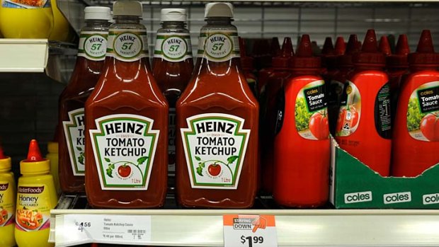 Price cutting sauce wars: Home brand bottles of sauce are shown next to Heinz sauce, with quite a large price discrepancy.