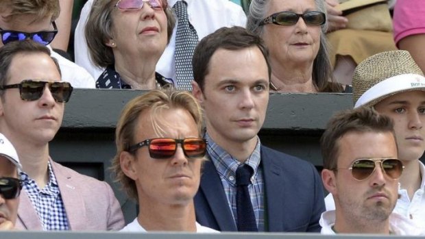Actor Jim Parsons watches from the players box.