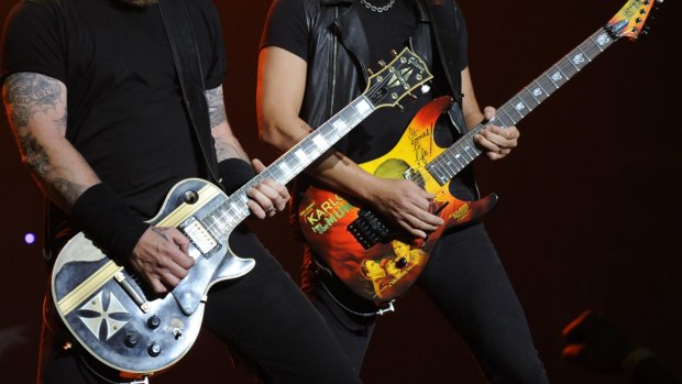 James Hetfield, left, and Kirk Hammett of Metallica perform at a benefit concert for The Silverlake Conservatory of Music in Los Angeles, Wednesday, May 14, 2008. (AP Photo/Chris Pizzello) squiz
