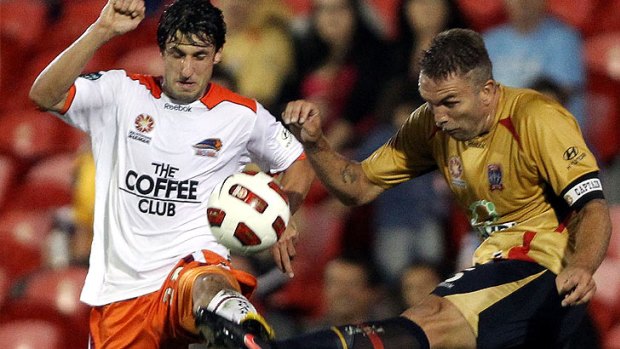 Brisbane Roar midfielder Thomas Broich taking on the Newcastle Jets last season.