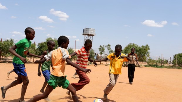 Play time: A game of football inside the camp.