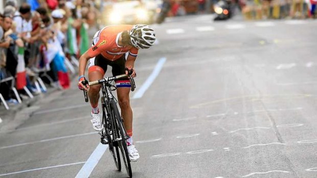 Marianne Vos of the Netherlands looks back she sucessfully defends her world title in Florence.