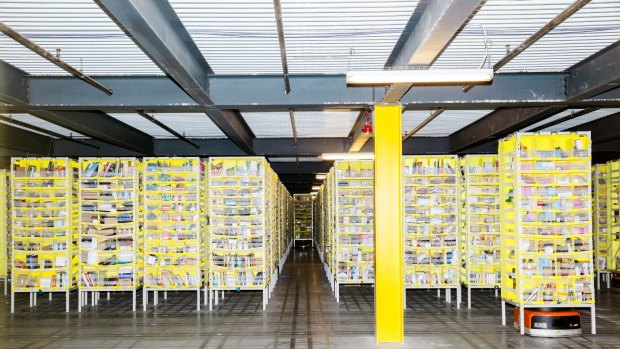 A robot fills orders inside an Amazon fulfilment centre in the US.