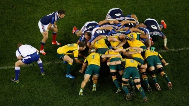 France and Australia pack down for a scrum at Etihad Stadium.