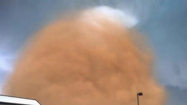 Monstrous swirling mass: The tornado, filmed by by oil worker Dan Yorgason, comes closer.