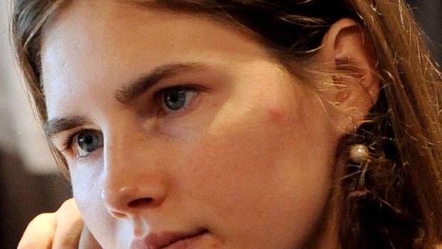 Fingers crossed ... Amanda Knox is hoping new evidence will overturn her conviction.