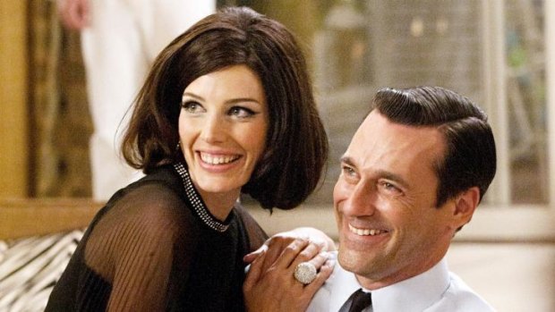 Megan (Jessica Pare) and Don Draper (Jon Hamm) in happier days on <i>Mad Men</i>.