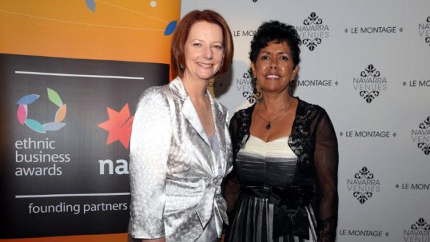 A long way from the bush ... Bradley with Prime Minister Julia Gillard at the recent Ethnic Business Awards.