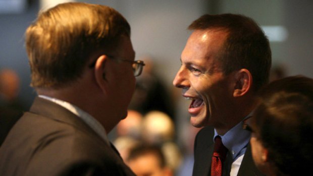 Opposition leader Tony Abbott speaking with Moore Wilton at the Italian National Day Celebrations. <i>Photo Steven Siewert</i>