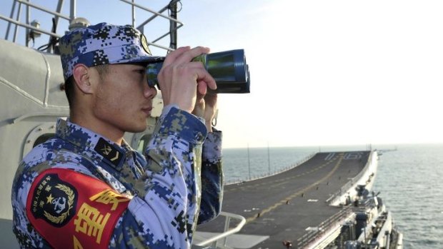 Rising tension: a Chinese warship in the East China Sea.
