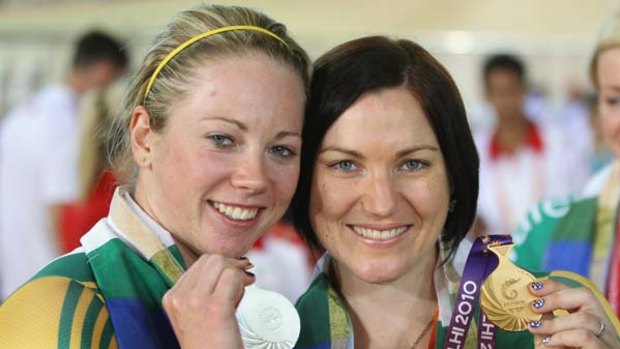 Australians Anna Meares, right, and Kaarle McCulloch show off their medals after the 500 metres time trial.