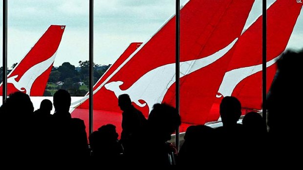"We cannot and we will not stand still": Qantas chief Alan Joyce says the airline has no choice but to cut jobs.