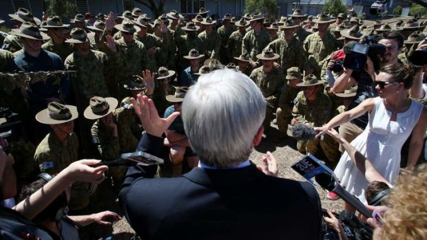 Prime Minister Kevin Rudd speaks to troops from the 4th Regiment at Lavarack Barracks in Townsville.