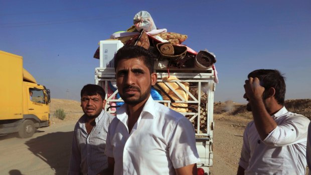 Displaced Iraqis return to their liberated villages.