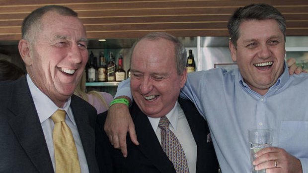 It's good to be the kings ... John Singleton, Alan Jones and Ray Hadley celebrate at a bar in Darling Harbour.