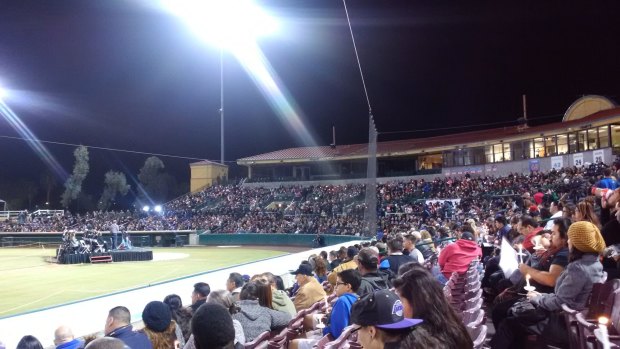 Candlelight vigil for the victims of the shooting in San Bernardino, at San Manuel Stadium.

