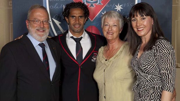 Red-and-blue bloods: Penny Mackieson (on the right) with fellow "Celtic Connection" Melbourne supporters Nick and Sue Massie, and Demon Aaron Davey, who retired this week, at a Melbourne player sponsor function this year.