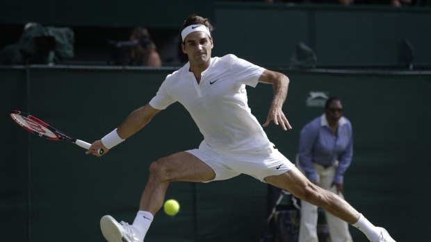 Moving freely ... a back injury slowed Roger Federer during his 2014 Wimbledon campaign, but that is not the case this year.