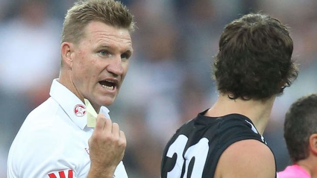 In charge: Nathan Buckley barks the orders.