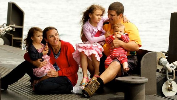 Close call: Glen and Kylie Borg with their children (from left)Bronte, Hannah and Alexander.