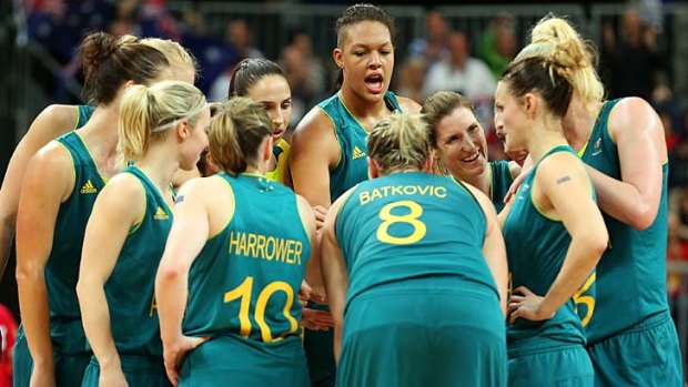 Standing tall ... the Opals celebrate after defeating Russia.