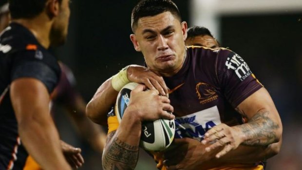 Daniel Vidot of the Broncos is tackled during the round 11 NRL match between the Wests Tigers and the Brisbane Broncos.