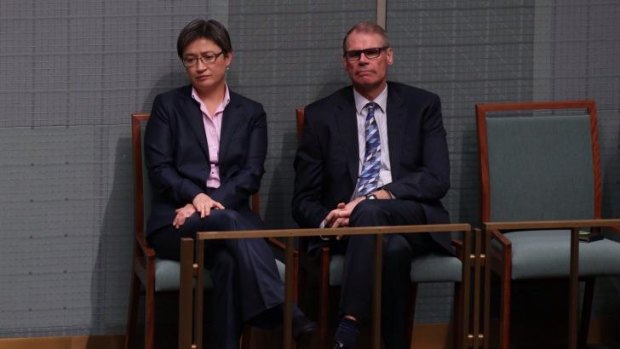 Labor senators Penny Wong and John Faulkner listen to MPs pay tribute to Mr Whitlam in the House of Representatives.