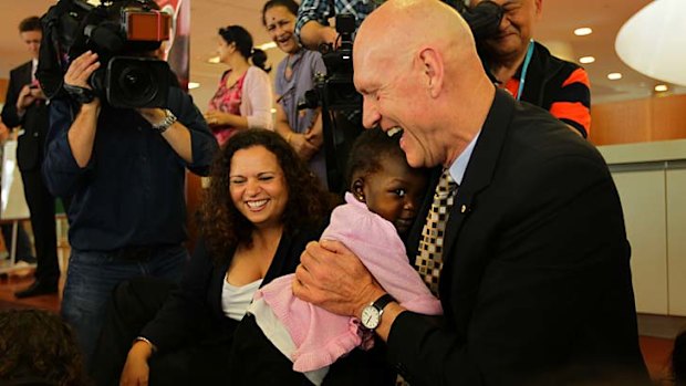 Charmed: Peter Garrett receives a hug from Elizabeth Malueth.