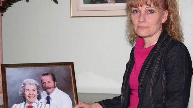 Karen Ferguson with a photo of her late father, Lindsay.