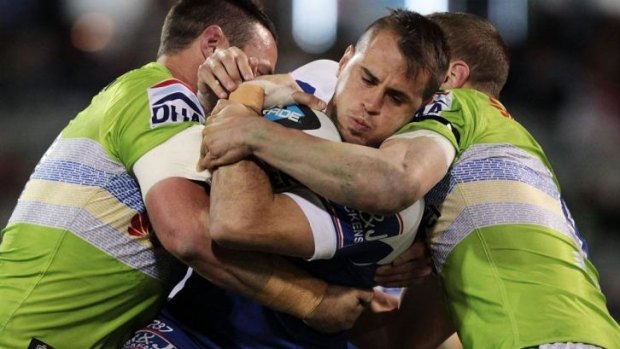 Bulldogs five-eighth Josh Reynolds is kept warm in chilly Canberra by the Raiders defence less than 48 hours after starring for NSW in their Origin II win over Queensland.