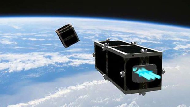 In this illustration provided by the Swiss Space Center of the Swiss Federal Institute of Technology, the CleanSpace One is chasing its target, one of the CubeSats launched by Switzerland in 2009.