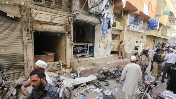 A bomb at a Karachi mosque on Friday left at least six injured, while Pakistani troops killed 80 militants in heavy clashes in the lawless north-west in recent days.